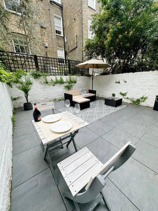 Londwell, Luxe And Leaves, Chelsea Flat With Private Garden Lägenhet London Exteriör bild
